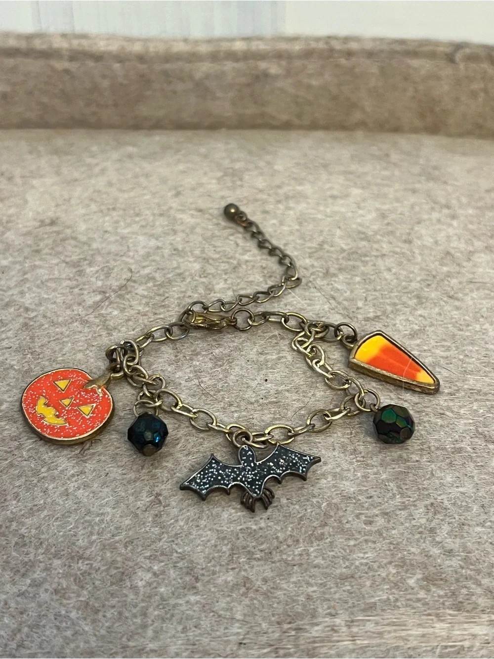 Adorable Halloween charm bracelet! With pumpkin, candy corn, and bat charms